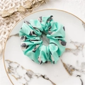 Mint green scrunchie featuring a cartoon pug dog pattern for women hair accessories - Pug Green