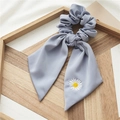 Daisy embroidered knot hair scrunchie with light purple satin ribbon in a wooden tray - Light Blue Daisy Ribbon