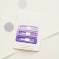 Tre fermagli per capelli viola sfumati su un biglietto fatto a mano di colore bianco - Set a Forma Rettangolare