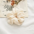 Off-white seersucker scrunchie with swiss dot texture and elegant pleated style - Swiss Dot Off-white