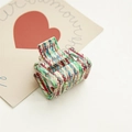 Detailed shot of 6cm acetate hair claw clip featuring colorful mosaic grid pattern - Colorful Mosaic Grid
