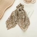 Detailed texture of brown floral chiffon hair scrunchie with long ribbon streamers - Dandelion Coffee