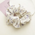 Detail of floral scrunchie in beige chiffon fabric with purple flower pattern - Little Purple Flower