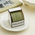 Detail of green high-elasticity braided hair bands in a minimalist gift box packaging - Light Green