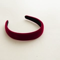 Detail shot of the burgundy velvet headband showing soft texture and black non-slip lining - Burgundy
