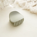 Close-up of matte bean green hair claw clip with smooth texture and sturdy teeth - Matte Mint Green