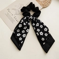 Eleganter schwarzer Haargummi mit weißen Blumenmustern und langen Bändern - Blume Schwarz