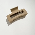 Detail view of a 11cm matte beige rectangular shark hair claw clip with spring structure - 11cm / 11cm Rubber Paint Khaki