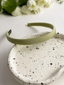 Detailed view of light green plaid headband with handmade label and woven texture - Avocado Green Fabric Style / Green