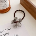 Floral hair tie featuring a smoky grey ink pattern resin flower and brown elastic band - Transparent Flower