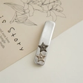 Silver rectangle hair clip featuring retro star charms on an artistic paper background - Thin Solid Star Hair Clip