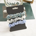 Set di 3 elastici per capelli con motivo floreale blu, rete bianca e tessuto plissettato - Floreale Blu (FS3526)