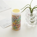 Colorful macaron hair elastic bands in a transparent jar with various pastel colors - Multicolor Canister
