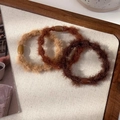 Detailed view of three plush hair scrunchies in brown tones with acrylic bead accents - Coffee With Bead