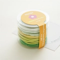 Elastische Haargummis Set in Grün und Gelb verpackt in einem klaren Rundbehälter - Basis Grün-Serie