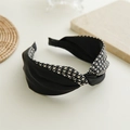 Detail of elegant black and white houndstooth knotted headband on a textured background - Double Fabric Houndstooth Light Coffee