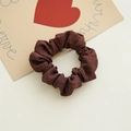Detailed view of a dark brown elastic scrunchie made of textured pleated fabric - Dark Coffee