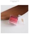 Dettaglio di cinque elastici per capelli sfumati rosa in una scatola trasparente - Stile ad Alta Elasticità / Rosa Ragazza