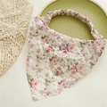 Detail view of floral headscarf with pink rose patterns and elastic band on textured fabric - Silver Silk Rose Floral Pink Bandana