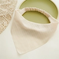 Close-up of beige elastic headscarf fabric with fine grid texture and silver glitter detail - Silver Silk Cream Bandana
