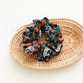 Halloween scrunchie featuring a gothic skull hand and floral print on black fabric - Hair Tie / Black Flower Skull Hand (万圣黑色花发圈)