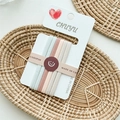 Close-up of five seamless high-elastic hair ties in soft Morandi colors on a card - Light Colors