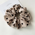 Detail view of cream satin scrunchie with black polka dots on white background - Light Coffee Polka Dot Style