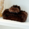 Detailed view of a dark brown faux fur hair claw clip against a minimalist background - 15cm Square Dark Coffee