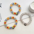 Set of 3 rainbow gradient and sequin telephone wire hair ties with metal charms - Multicolor