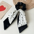 Detail of floral chiffon scrunchie with layered long ribbons and soft fabric texture - Small Floral Pattern Double Layer / White