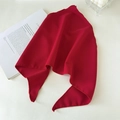 Detail of red fabric headscarf with fine stitching and soft chiffon texture - Red
