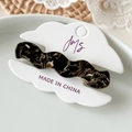 Fermaglio per capelli ondulato in acetato tartarugato scuro su carta decorativa - Wave Coffee