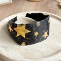 Detail of black satin wide headband with gold stars and glitter for Halloween parties - Star Print Style (FG4585)