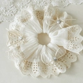 Close-up of cream lace scrunchie featuring delicate pearl bows and intricate floral edges - Creamy White Lace Pearl Hollow Out Scrunchie / Off White