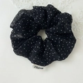 Detalle de coletero negro con lunares blancos en tela de gasa ligera - Negro