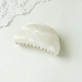 Macro detail of cream marble texture on acetate hair claw clip with smooth polished finish - Semicircle White