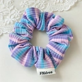 Detailed close-up of striped scrunchie in blue and pink with woven brand label - Blue Pink Striped (Single)