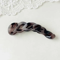 Eleganter Bananen-Haarclip mit dunkelgrauem und kaffeebraunem Schildpatt-Resin-Design - Verdrehtes graues Schildpatt