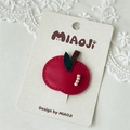 Detailed view of handmade red apple faux leather BB hair clip with decorative beads - Red Apple
