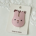 Cute pink leather rabbit hair clip for girls with detailed embroidery on beige backing - Rabbit Head