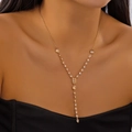 Detail of elegant gold Y-shaped layered necklace with sparkling zircon drop pendant - Geometric Inlay Style (Gold Color)