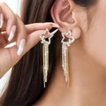 Elegante goldene Stern-Ohrringe mit glitzernden Strass-Quasten und hohlem Sterndesign - Goldener Stern Quasten Stil (ER23Y0449)
