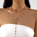 Three-layer gold necklace set featuring cross pendant and colorful gemstone accents - Three-Layer Colorful Rhinestone Cross Necklace Style (NC25Y1300) / Gold