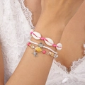 Detail of bohemian ocean bracelet set featuring pink beads, sea shells and turtle charms - Bracelet / Pink