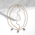 Detail of gold multilayer chain headpiece with rhinestones and teardrop crystal pendants - Waterdrop Forehead Chain / Gold