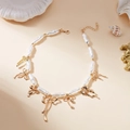 Collana di perle barocche con ciondoli a fiocco dorati e catena regolabile con chiusura - Stile Fiocco (#5Fiocco)