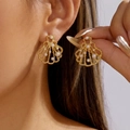Golden seashell stud earrings with white pearls and vintage textured matte finish - Gold Hollow Shell Artificial Pearl Style / Pearl Shell Earrings
