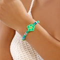 Colorful summer beaded bracelet featuring green plumeria flower and vibrant resin beads - Crystal Polymer Flower (Green)