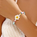 Bohemian colorful clay bead bracelet with a white plumeria flower charm for women - Crystal Polymer Flower (White)