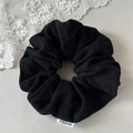 Close-up of black velvet scrunchie showing premium texture and small FMdrea label - Large / Black